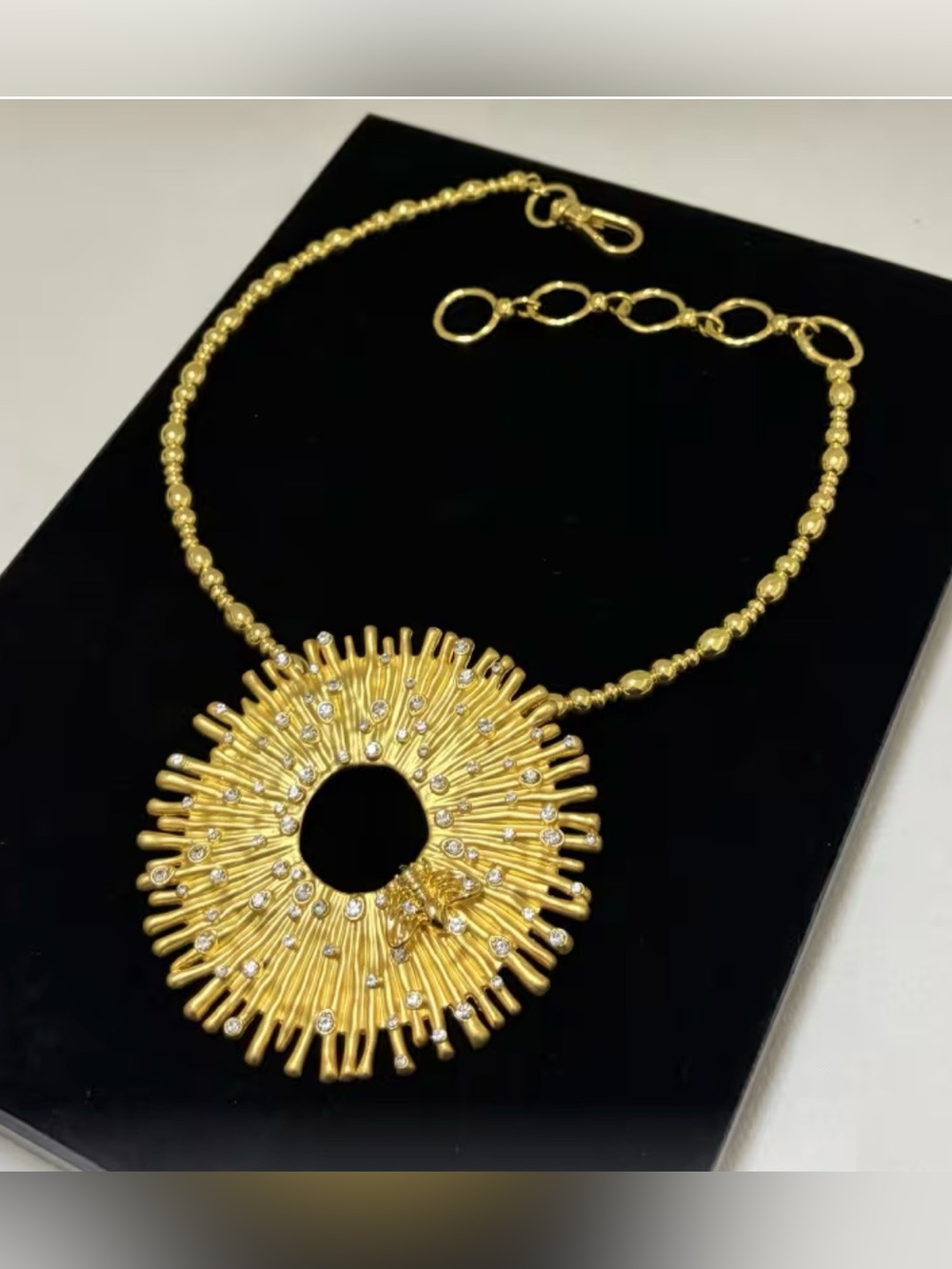 Schiaparelli Inspired Gold Sunburst Pendant Necklace